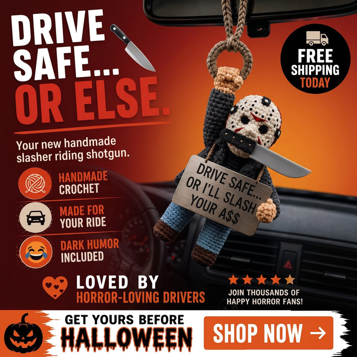 Handmade spooky crochet car ornament hanging from a rearview mirror